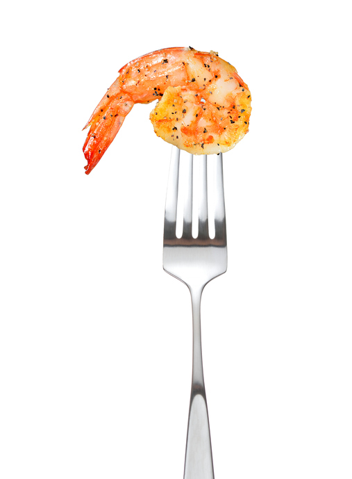 Cooked shrimp on fork 626645312 509x692